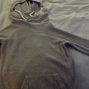 Tan sweater hoodie with cowl neck.